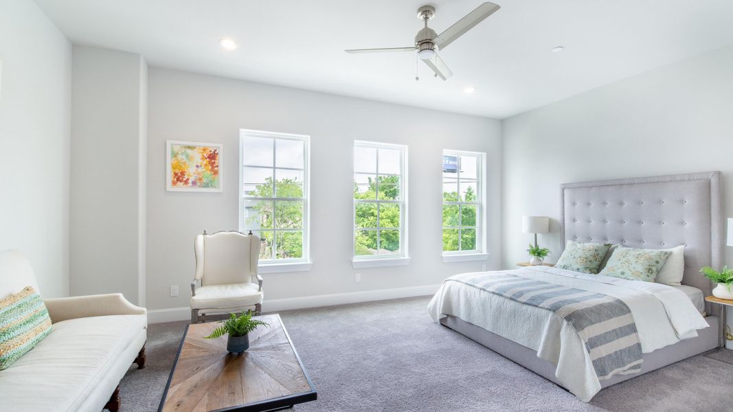 Furnished interior in a model home at Upper East River in Houston (Image 16).