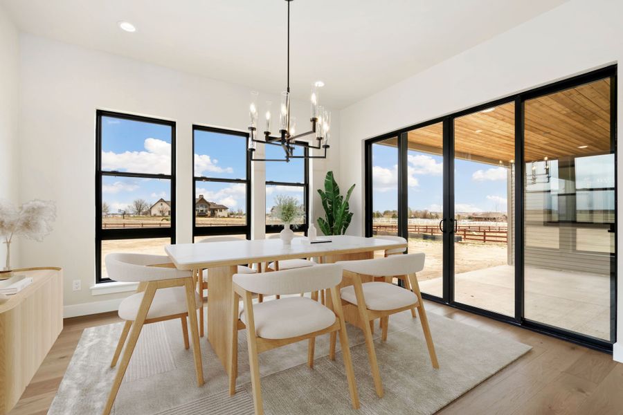 Furnished interior in a model home at Acadia at RainDance in Windsor (Image 10).