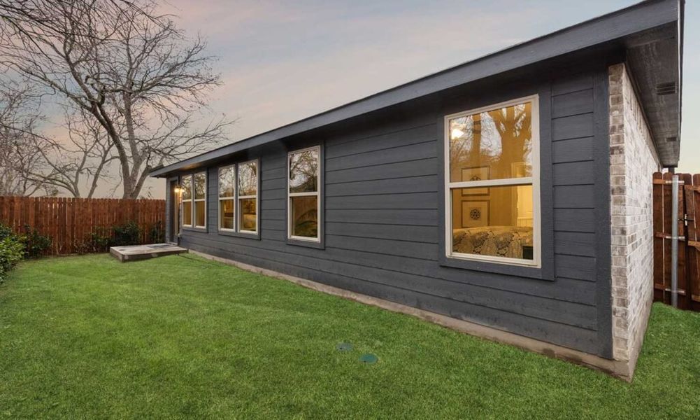 Front exterior of a home in the Brookville Ranch community, located in Fort Worth, TX (Image 13).