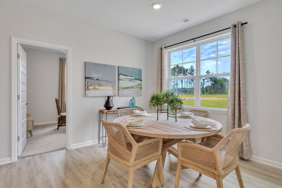 Furnished interior in a model home at Westbrook Retreat Villas at Savannah Quarters in Pooler (Image 18).