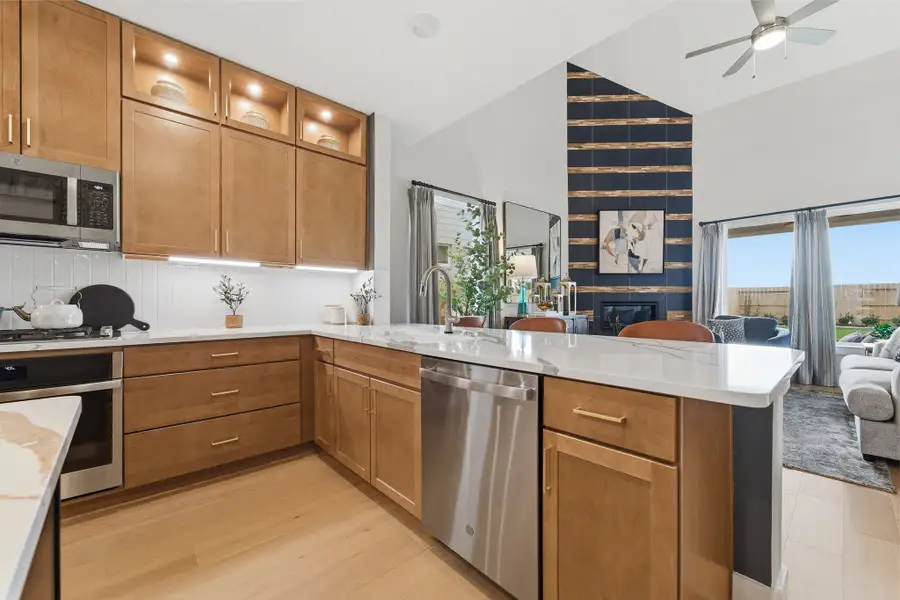 Furnished interior in a model home at Wildrye in Waller (Image 28).