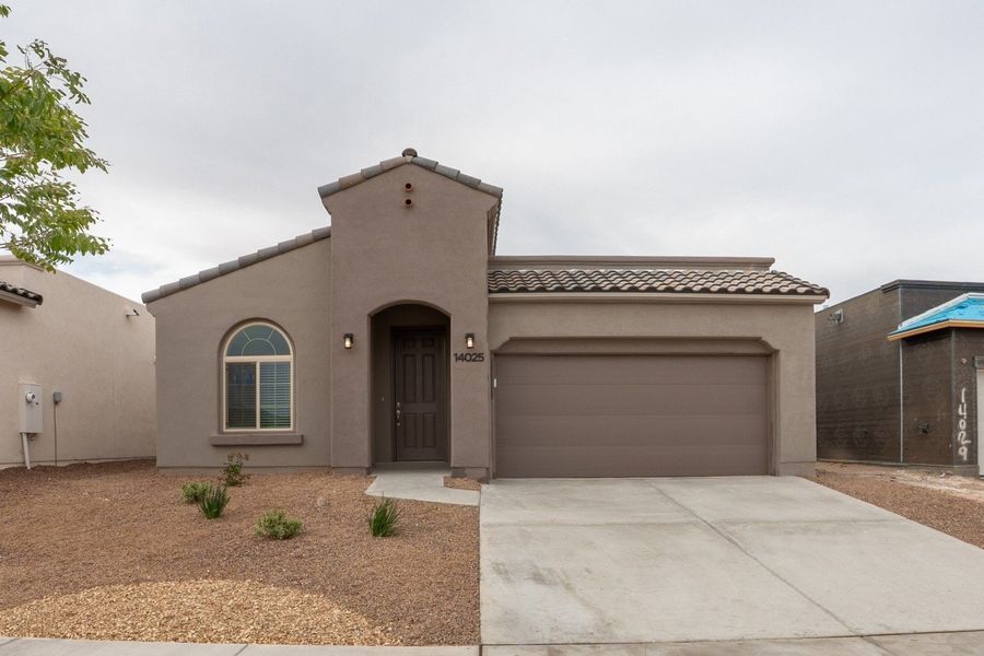 Front exterior of a home in the Paseo Del Este community, located in El Paso, TX (Image 22).