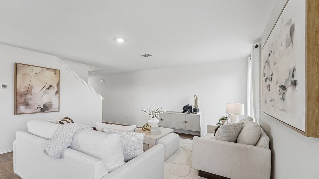 Furnished interior in a model home at Marigold in Kyle (Image 12).