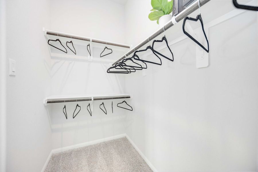 Tejas Village Model Home - Primary Closet Tejas Village Model Home - Primary Closet