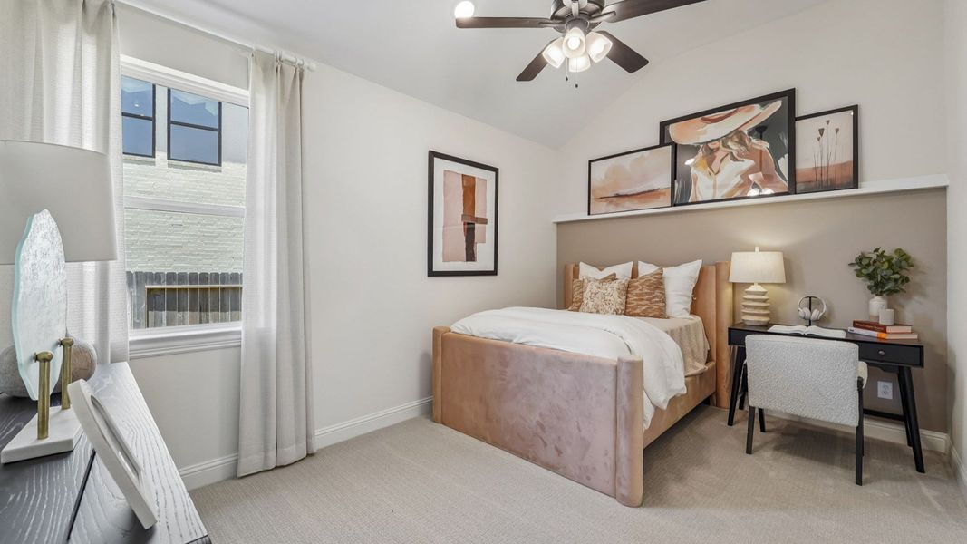 Experience refined comfort with plush textures and sleek art in this Woodlands Hills bedroom.