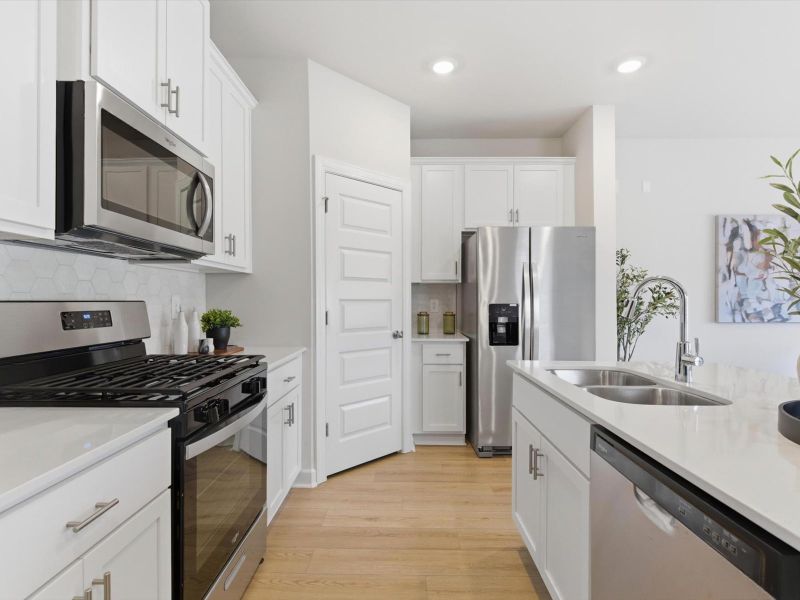 Furnished interior in a model home at Crossing at Abner Creek Townes in Greer (Image 8). Furnished interior in a model home at Crossing at Abner Creek Townes in Greer (Image 8).