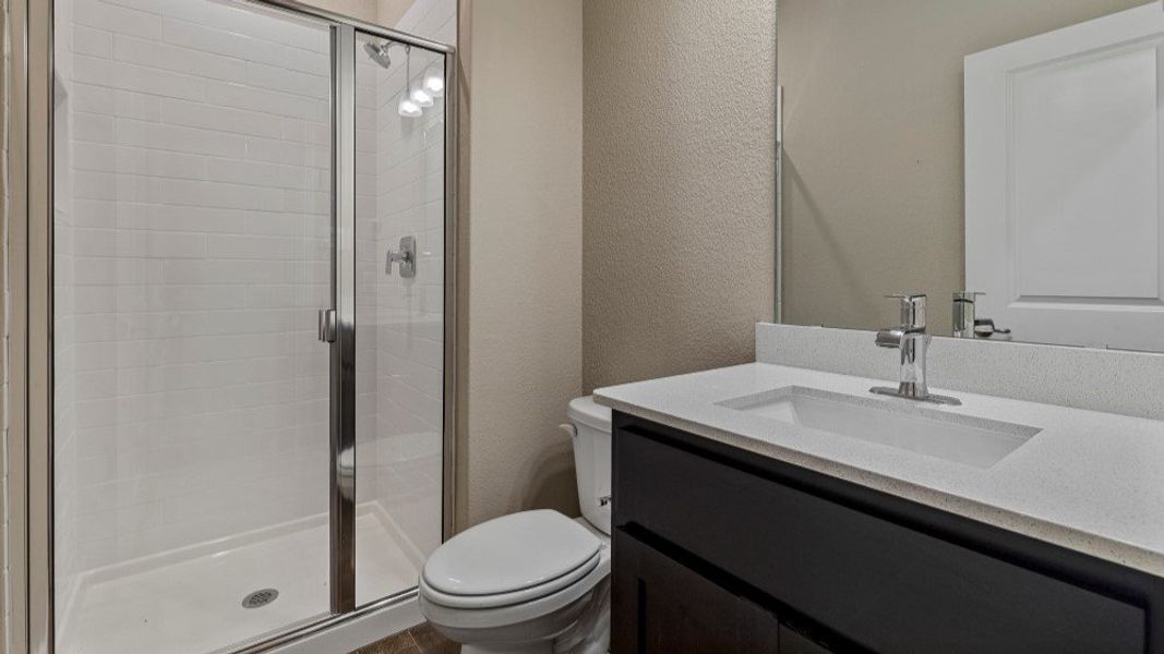 Furnished interior in a model home at Eden Ranch in Arlington (Image 31).