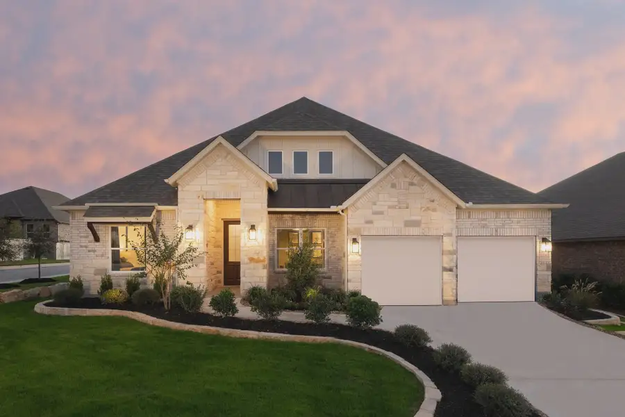 Front exterior of a home in the Sunday Creek at Kinder Ranch community, located in San Antonio, TX (Image 4).
