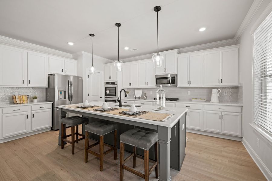 Furnished interior in a model home at Traditions of Braselton in Jefferson (Image 8).
