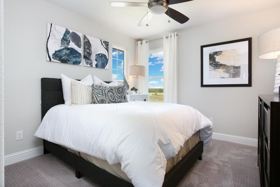 Furnished interior in a model home at Casetta Ranch in Kyle (Image 54).