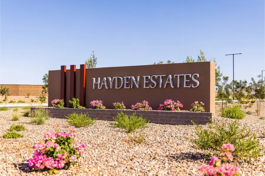 Entrance to the Hayden Estates community in Buckeye, AZ, featuring signage and landscaping (Image 1). Entrance to the Hayden Estates community in Buckeye, AZ, featuring signage and landscaping (Image 1).