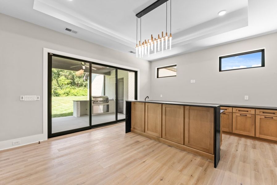 Furnished interior in a model home at The Hills in Thompson's Station (Image 7).