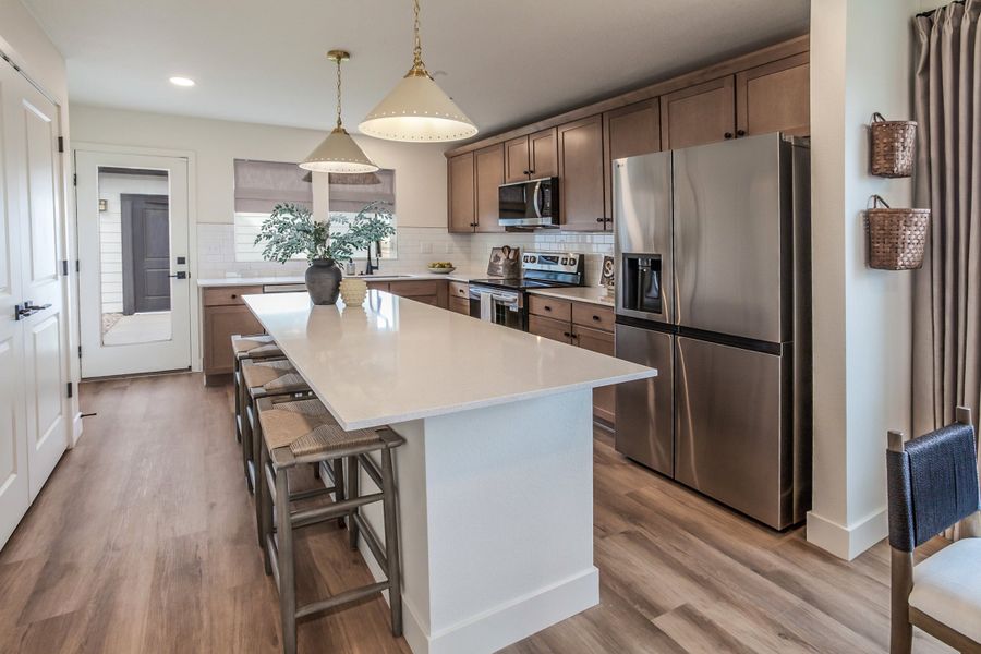 Furnished interior in a model home at Prairie Song in Windsor (Image 51).