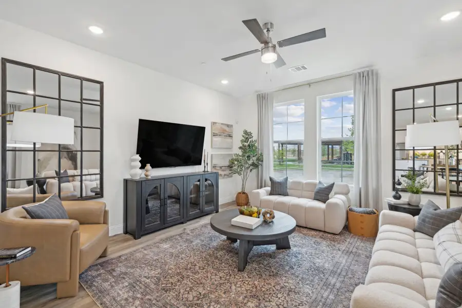 Furnished interior in a model home at Twin Creeks Watters in Allen (Image 9).
