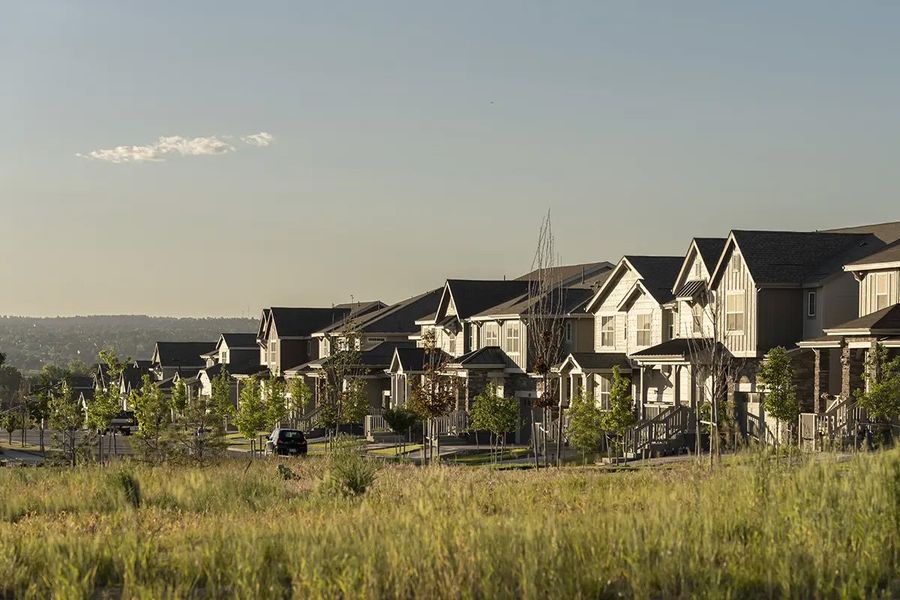 Front exterior of a home in the The Duos at Looking Glass community, located in Parker, CO (Image 2).