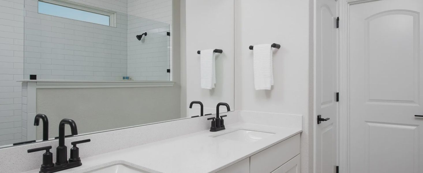 Furnished interior in a model home at Covered Bridge in Hutto (Image 32).