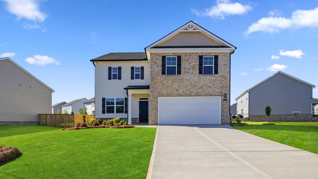 Front exterior of a home in the Cedar Ridge - Locust Grove Station community, located in Locust Grove, GA (Image 16).