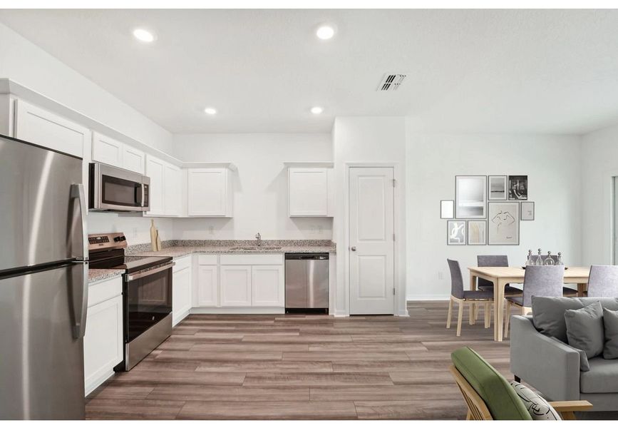 Furnished interior in a model home at Aster Towns in Summerville (Image 4).