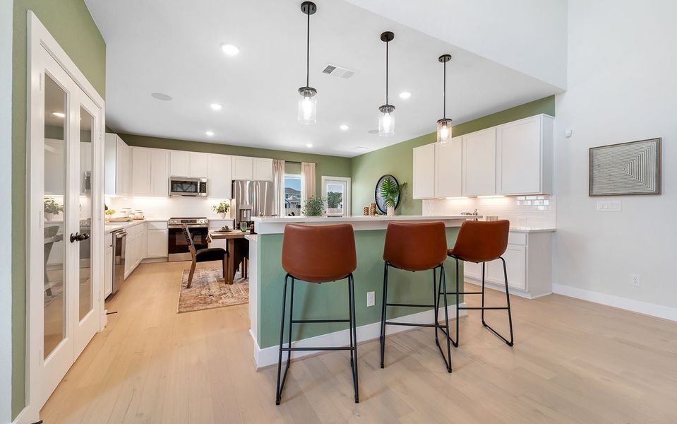 Furnished interior in a model home at Grande Estates in Bertram (Image 19).