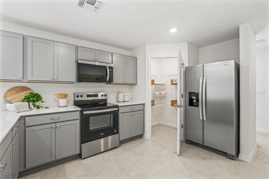 Furnished interior in a model home at Spanish Lakes in Port St. Lucie (Image 11).