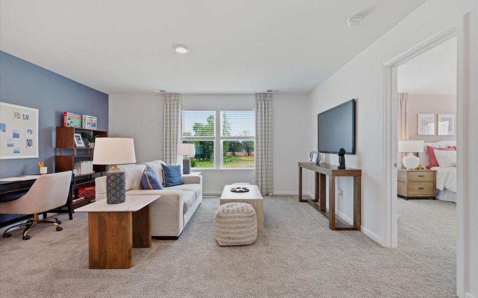 Furnished interior in a model home at Riverwalk Pointe at Mallory Creek - Townhomes in Leland (Image 28). Furnished interior in a model home at Riverwalk Pointe at Mallory Creek - Townhomes in Leland (Image 28).