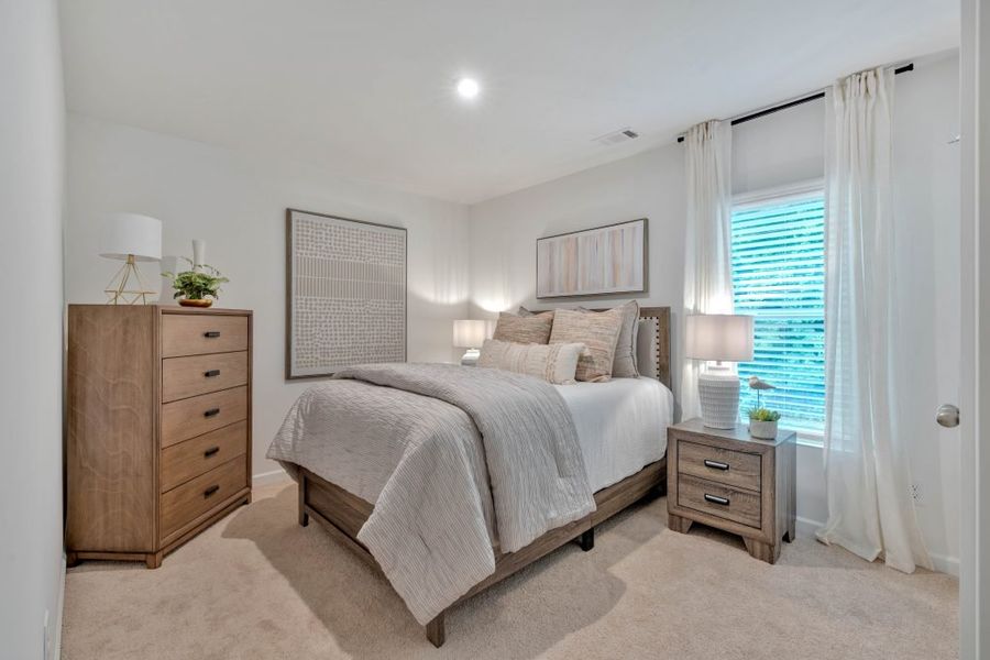 Furnished interior in a model home at Meadow Pines in Dallas (Image 34).