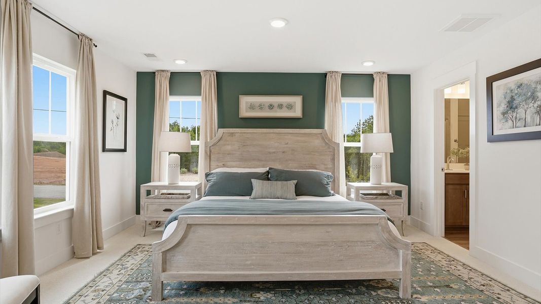 Memorable mornings begin in this tasteful and thoughtfully crafted primary suite located in Greenville, SC