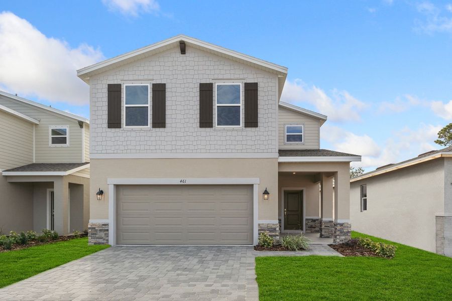 Front exterior of a home in the Watermark community, located in Cocoa, FL (Image 4).