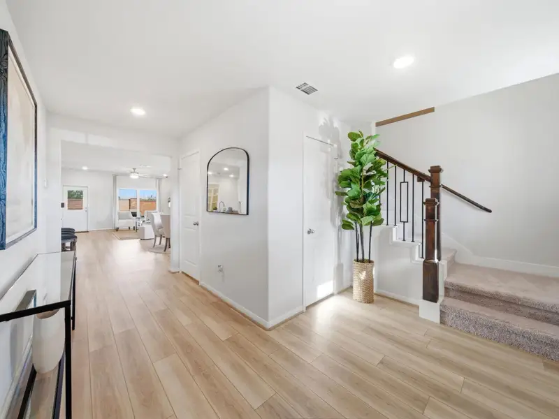 Furnished interior in a model home at Sunterra in Katy (Image 9).