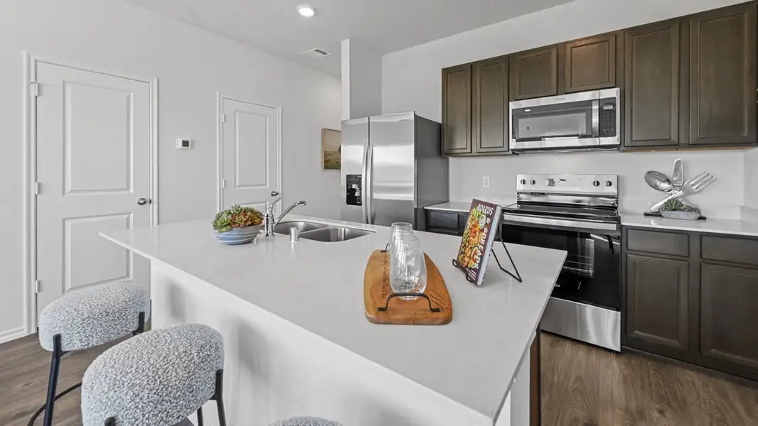 Furnished interior in a model home at Cartwright Mays in Crandall (Image 6). Furnished interior in a model home at Cartwright Mays in Crandall (Image 6).