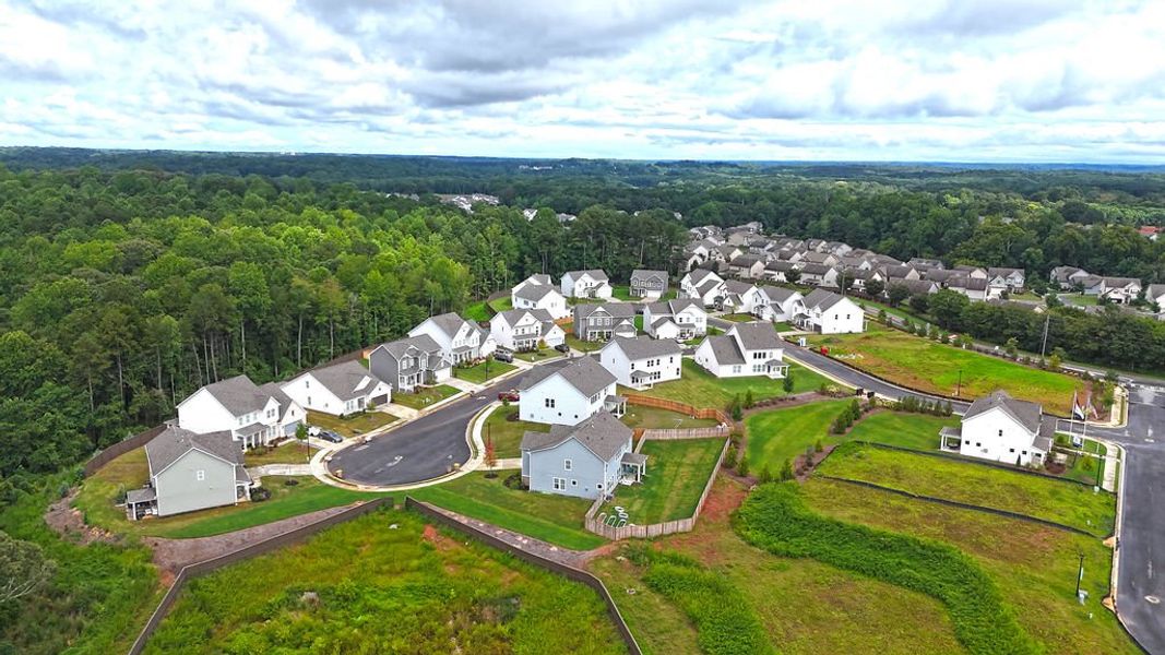 Aerial view of the Maddox Landing community in Hoschton, GA, showing layout and nearby surroundings (Image 11). Aerial view of the Maddox Landing community in Hoschton, GA, showing layout and nearby surroundings (Image 11).