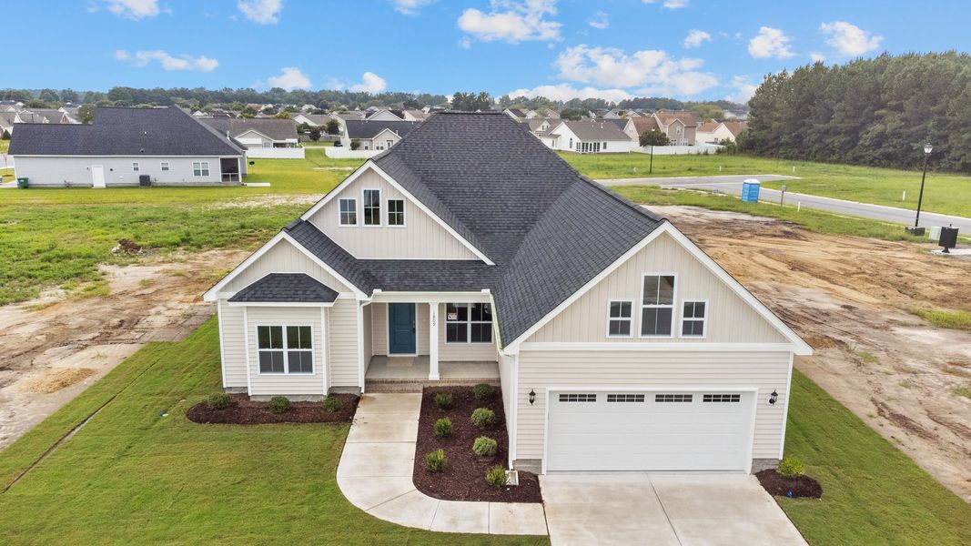 Front exterior of a home in the The Villas at Langston Farms community, located in Winterville, NC (Image 2).
