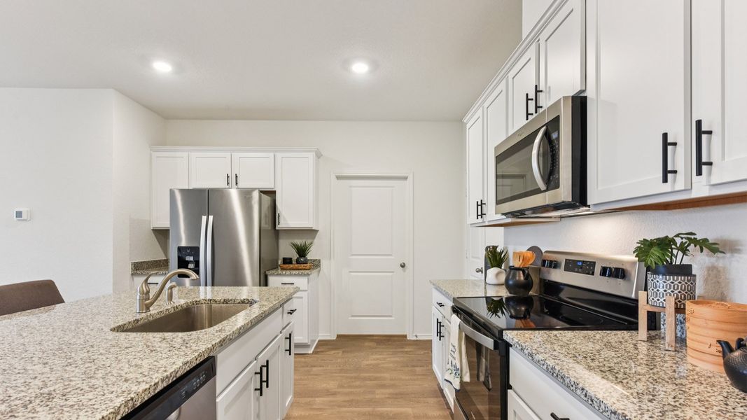 Furnished interior in a model home at Palomino in Manor (Image 22).