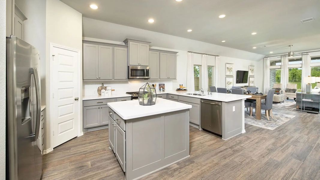 Furnished interior in a model home at Lakes Of Cane Island 45' in Katy (Image 28).