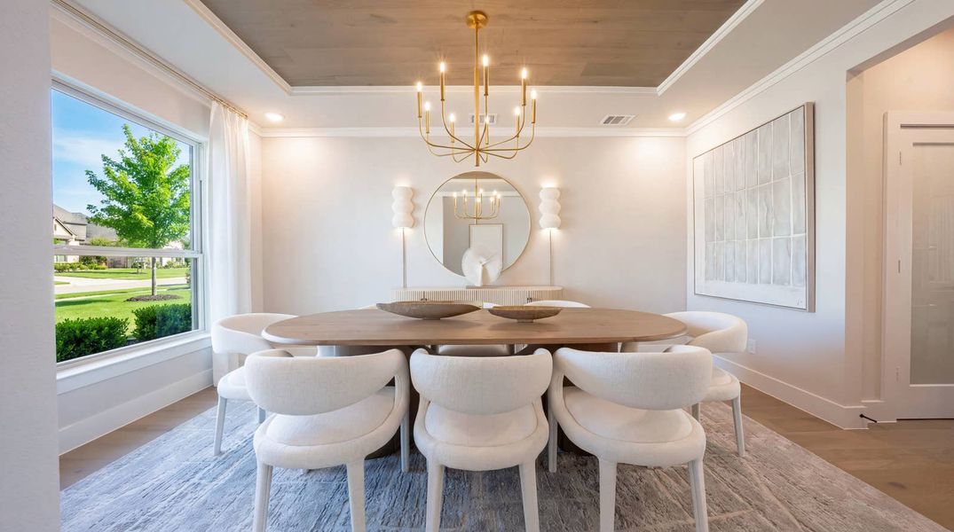 Furnished interior in a model home at High Country in Burleson (Image 2).