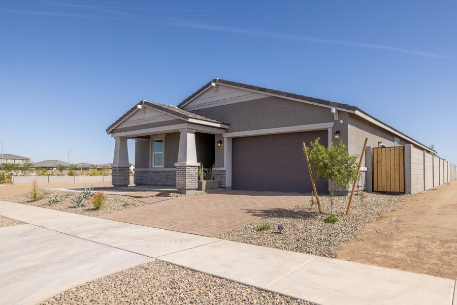 Front exterior of a home in the Blossom Rock Reserve Series community, located in Apache Junction, AZ (Image 5).