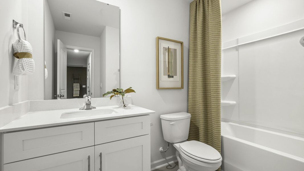 Furnished interior in a model home at The Estates at Edinborough in Gibsonville (Image 27).