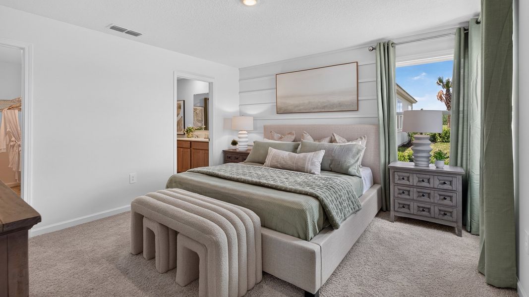 Furnished interior in a model home at Bridle Creek in Jacksonville (Image 29).