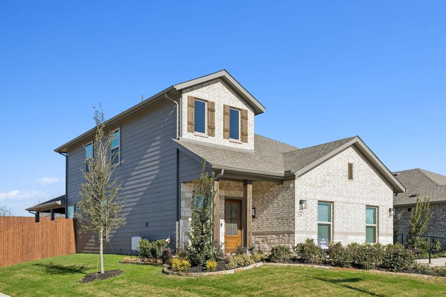 Front exterior of a home in the Belmont community, located in Aubrey, TX (Image 2).