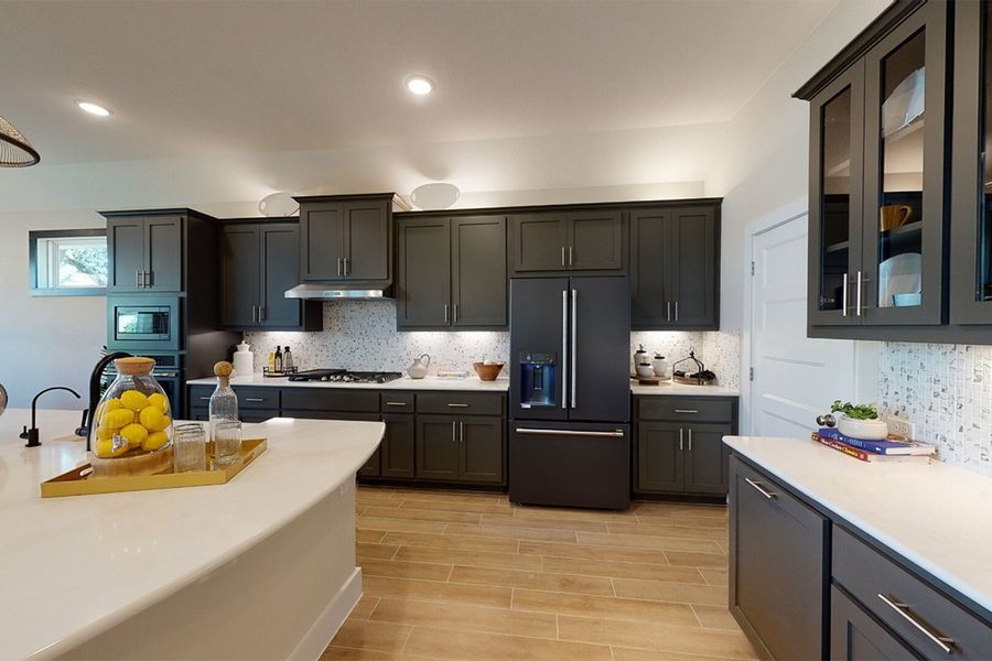 Furnished interior in a model home at The Grove at Blackhawk in Pflugerville (Image 7).