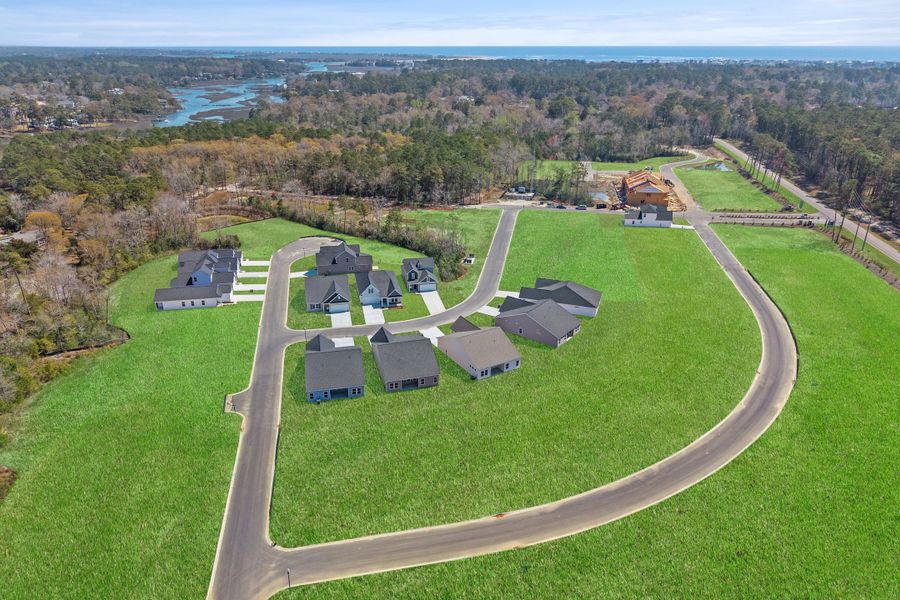 Aerial view of the Creekview Landing community in Shallotte, NC, showing layout and nearby surroundings (Image 9). Aerial view of the Creekview Landing community in Shallotte, NC, showing layout and nearby surroundings (Image 9).