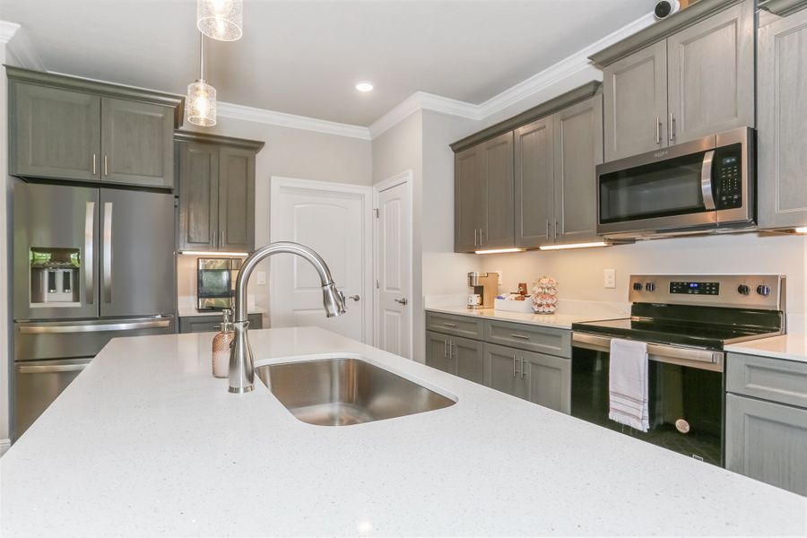 Furnished interior in a model home at Doyle Hawkins Landing in Navarre (Image 11).