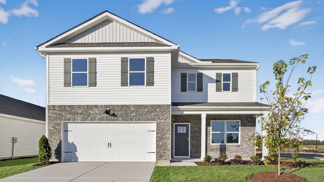 Front exterior of a home in the Honeycutt Oaks community, located in Angier, NC (Image 1).