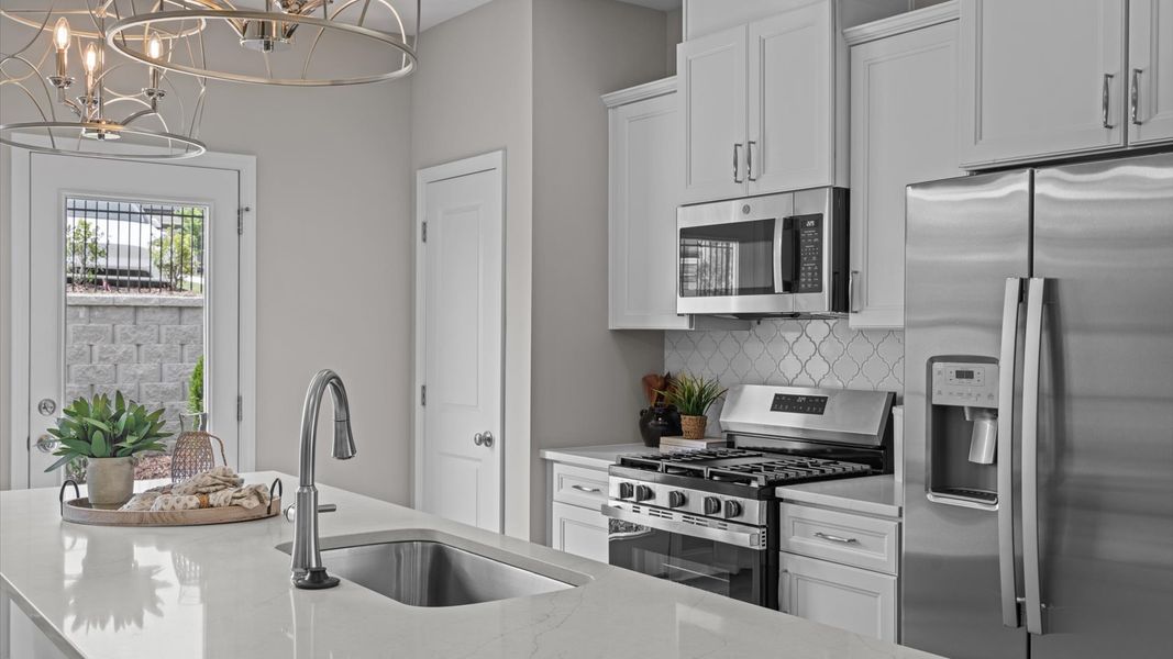 Furnished interior in a model home at Essex Townes in Franklinton (Image 9).