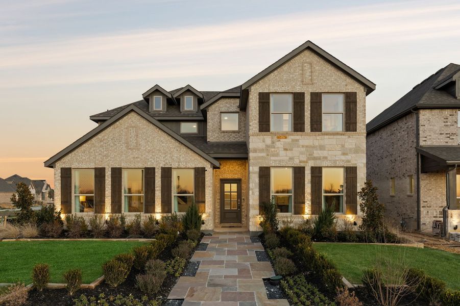 Front exterior of a home in the Redden Farms community, located in Midlothian, TX (Image 1). Front exterior of a home in the Redden Farms community, located in Midlothian, TX (Image 1).