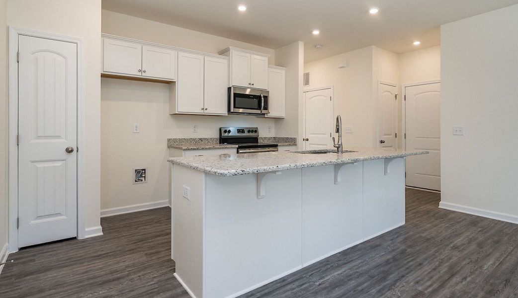 Furnished interior in a model home at The Cottages of Silvertown in Thomaston (Image 46).