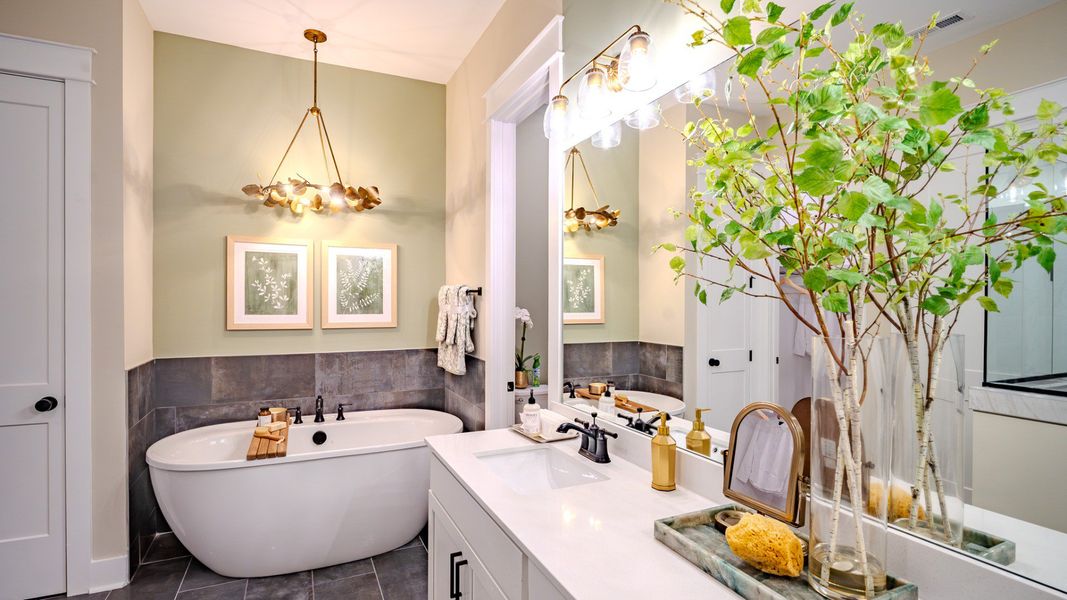 Primary bathroom with soaking tub and dual vanity Primary bathroom with soaking tub and dual vanity