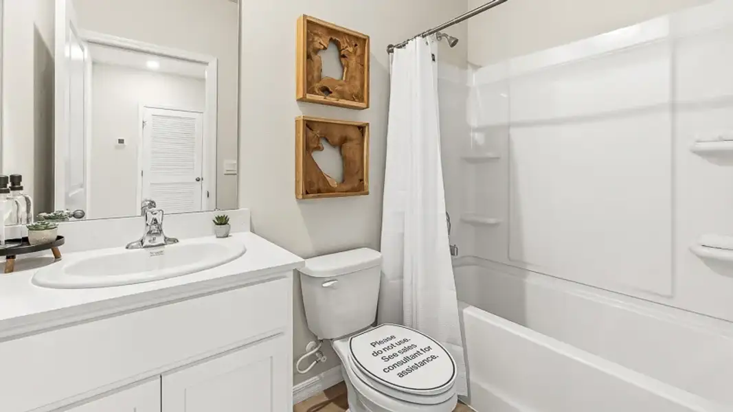 Furnished interior in a model home at Sage Park in Sarasota (Image 16).