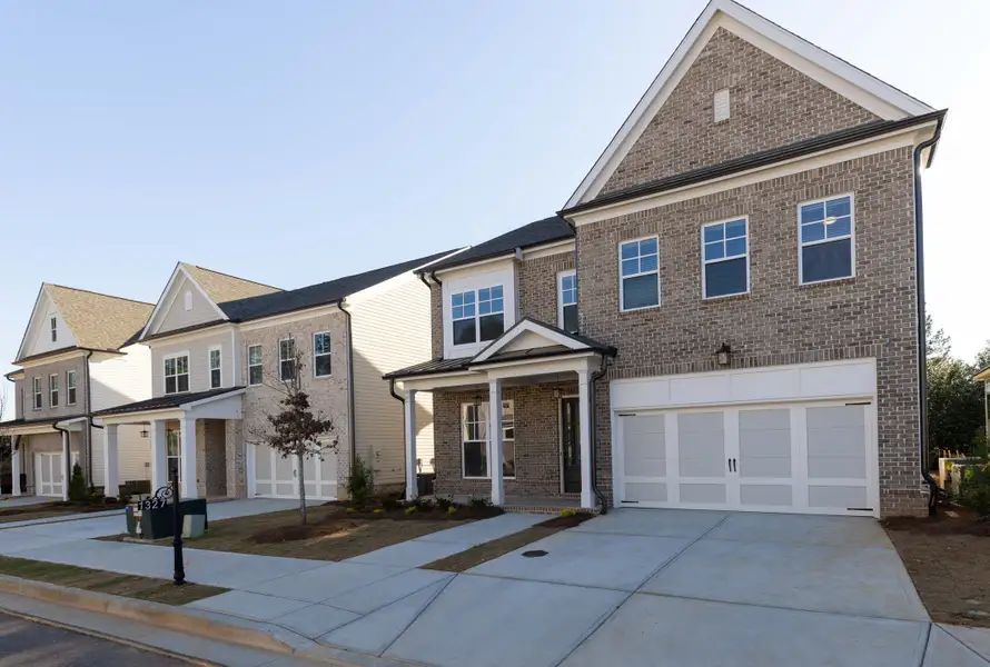 Front exterior of a home in the Waterhaven community, located in Cumming, GA (Image 9).