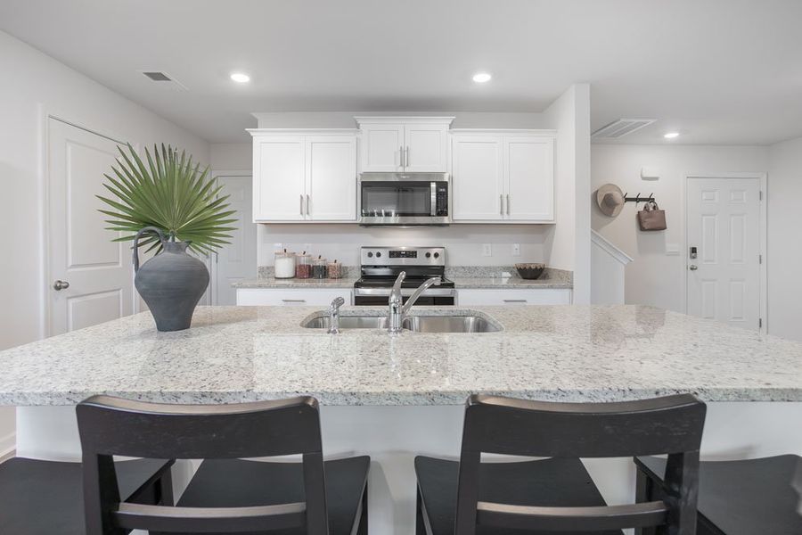 Furnished interior in a model home at The Grove at Riley's Meadow in Haw River (Image 9).